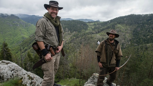 Kings Of The Wild Episode: Bulgaria  Matt Tebbutt (left) and Josh James are posing on a cliff overlooking the Izvore Hunting Estate