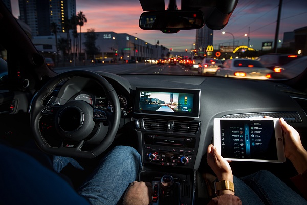 Last year, Delphi’s automated car drove itself across the country. In January at CES, Delphi will demonstrate the next step in something it is calling V2Everything. Delphi’s car will “talk” to other cars, to pedestrians and cyclists crossing the street, to traffic lights and signs, parking garages, coffee shops and burger joints. Widespread adoption of the active safety Delphi is working on has the potential to cut traffic fatalities in half. (Photo by John F. Martin for Delphi)